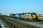 CR, Conrail SD45-2 6662 ex-EL 3677-CR GP40 3219 ex-PC- CR GP40 3013 ex-NYC, is nearing the end of its eastbound trip with TV98. The train has just crossed the river at HX and is entering the ex-Erie Croxton yard at Secaucus, New Jersey. February 10, 1977.